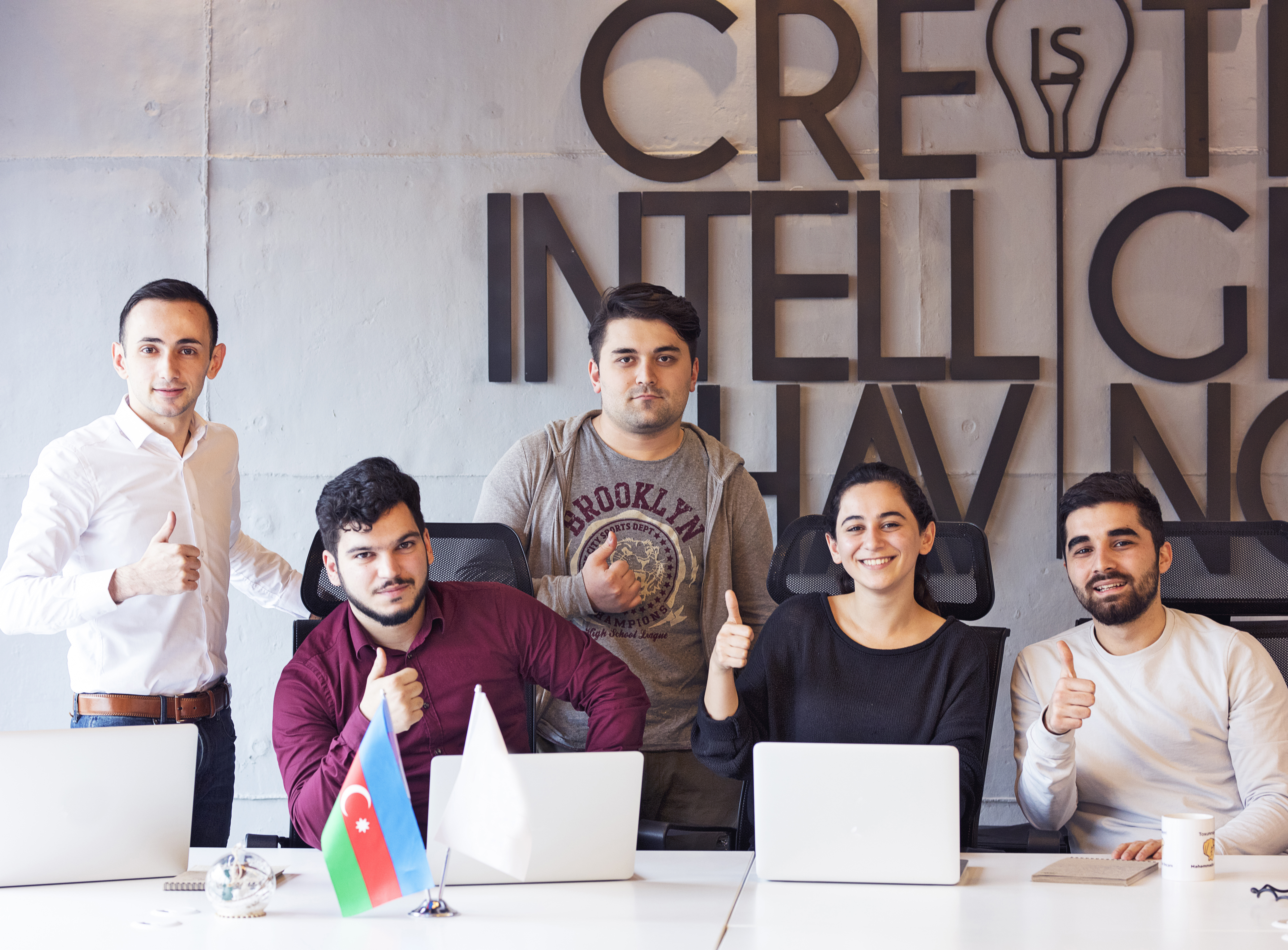 happy-motivated-colleagues-in-custom-content-development-office